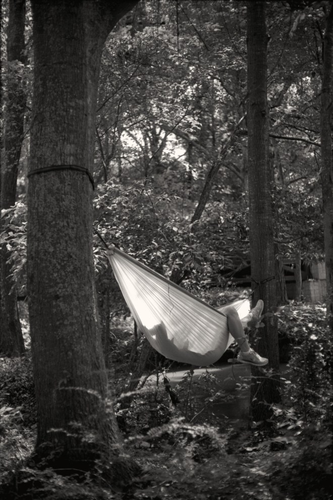 Girl relaxing in a hammock